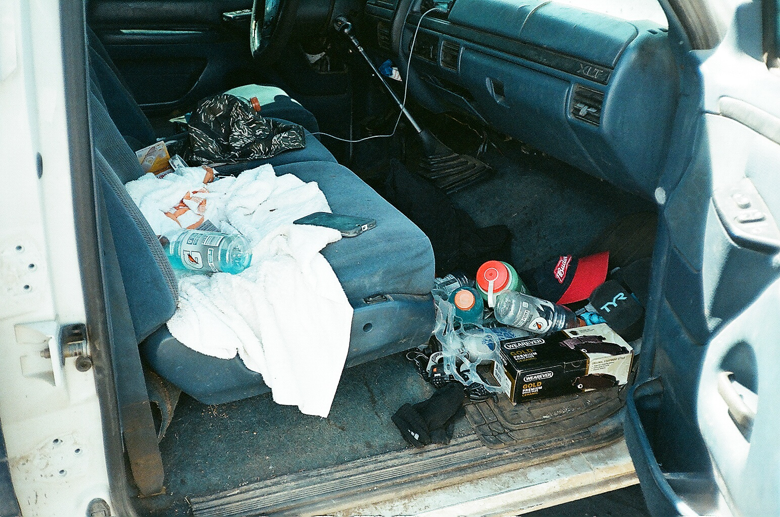 a photo of a dirty passenger seat